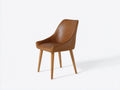 Silla de comedor tapizada efecto piel 55x60x85 cm - marrón caramelo - patas de madera y diseño moderno
